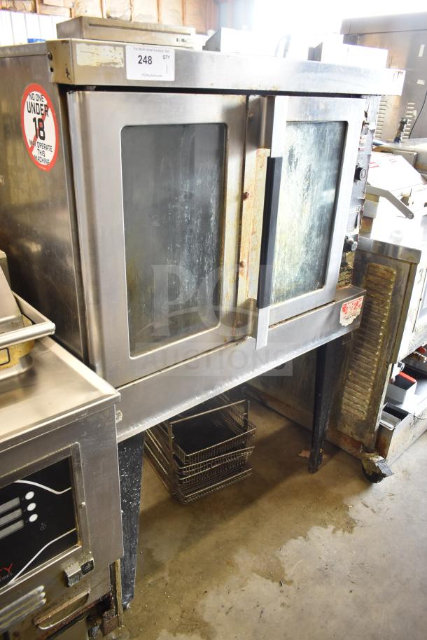 Hobart commercial full-size convection oven with view-through doors, thermostatic controls, metal legs, moderate wear.