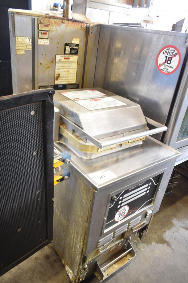 2020 Henny Penny PXE-100 electric pressure fryer on commercial casters, 208V, 3-phase, visible wear, instructional labels displayed.