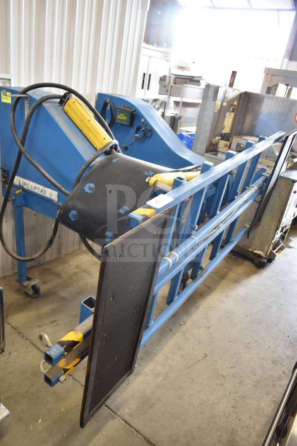 Vac Lift AS Commercial Unit in blue, featuring hydraulic arms and control panel. Appears in good condition with minor wear. Tags visible.