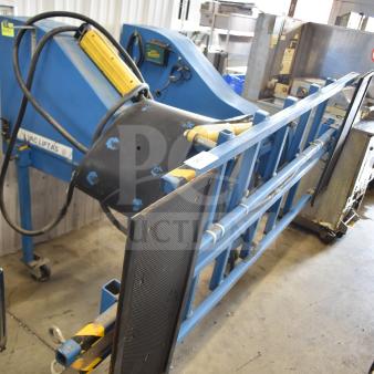 Vac Lift AS Commercial Unit in blue, featuring hydraulic arms and control panel. Appears in good condition with minor wear. Tags visible.