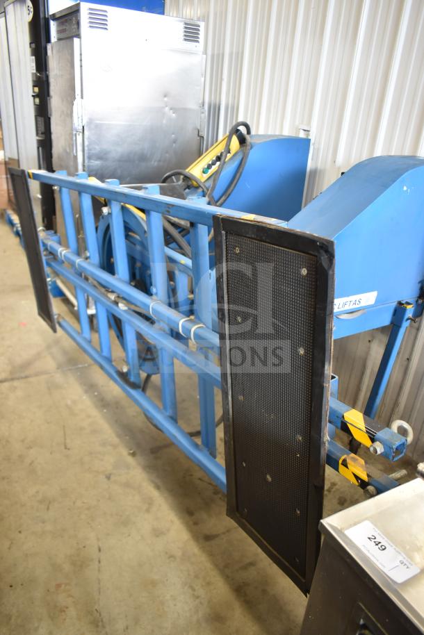 Vac Lift AS Commercial Unit, blue frame, black panels, used condition, label showing model and controls, auction tag 249.