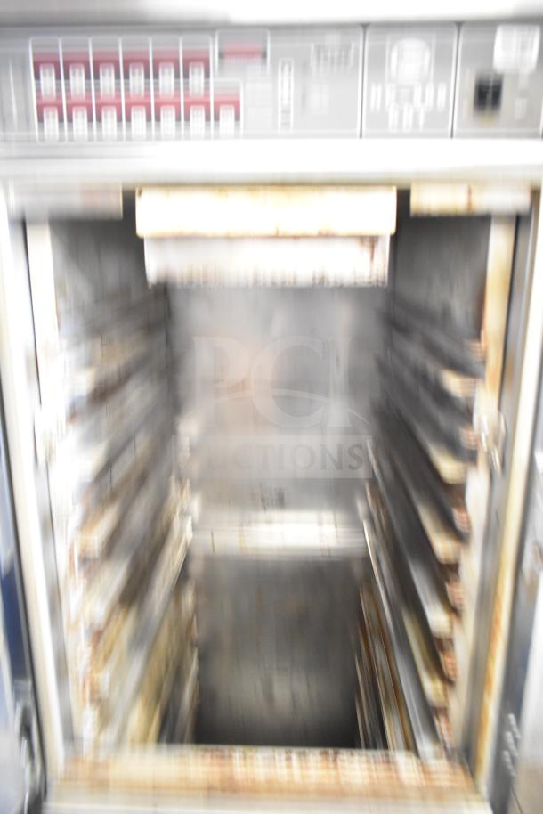 Henny Penny HC-900 CDT Commercial Heated Holding Cabinet, stainless steel, interior rack system, visible wear.