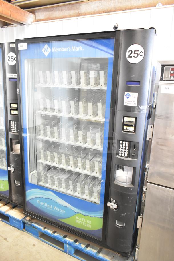 Crane 5800-4 commercial drink vending machine with bill acceptor, tested and working, displays 16.9 fl oz bottles, 115V, 1 phase.