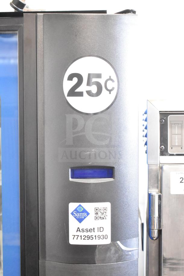 Crane 5800-4 vending machine, 115 volts, 1 phase, with bill acceptor. Features 25-cent pricing. Tested, working condition. Sam's Club asset ID visible.