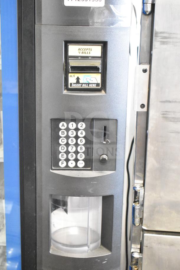 Crane 5800-4 vending machine with bill acceptor, keypad, and bill slot. Tested, working; 115 volts, 1 phase.