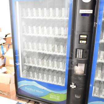 Crane 5800-4 commercial vending machine, 115V, 1 phase, tested and working, with bill acceptor, sells bottled drinks.