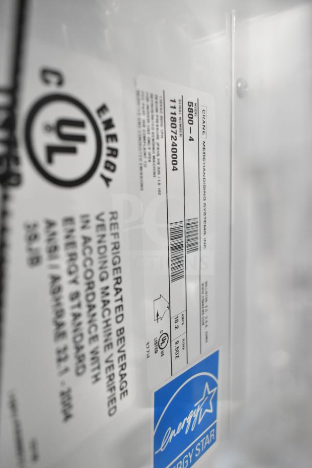 Crane 5800-4 commercial drink vending machine label showing model and serial number details, including Energy Star certification.