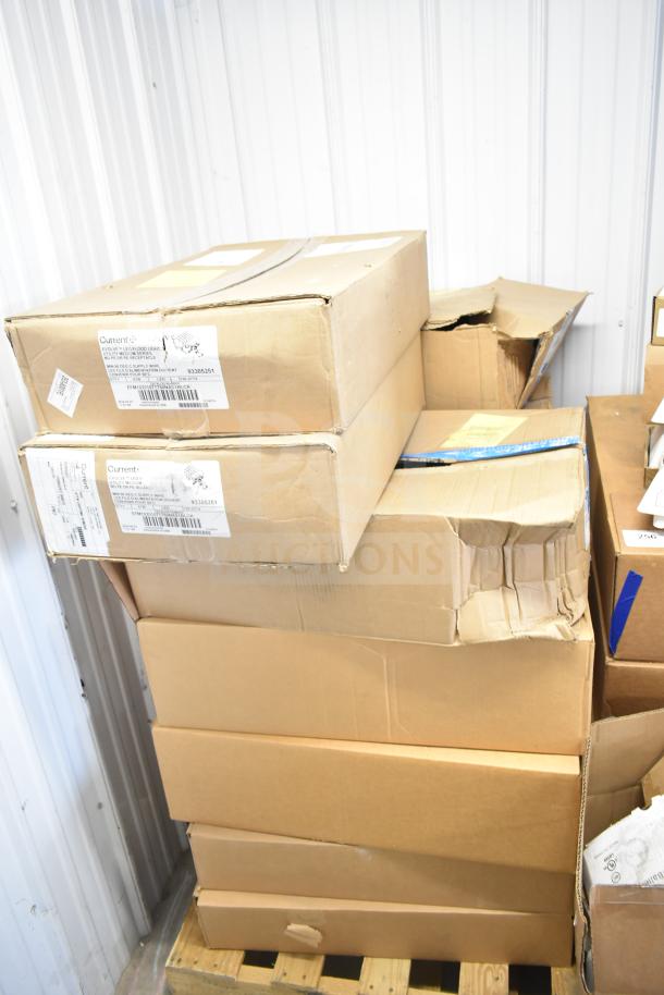 13 boxes of Current Evolve LED flood lights, original packaging, stacked on a pallet, visible condition varies.