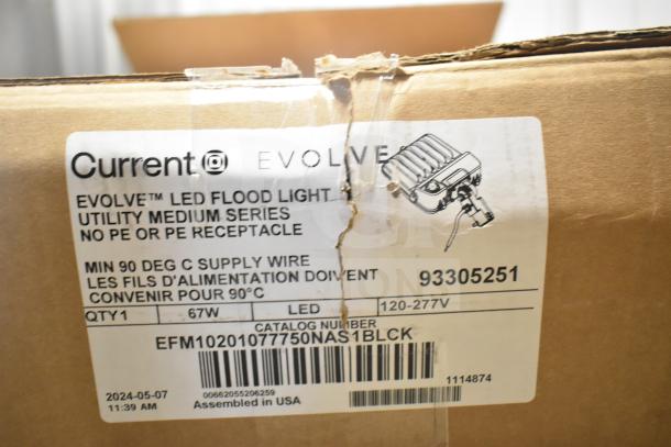 Current Evolve LED Flood Light in original box, catalog EFM10201077750NAS1BLCK, 67W, 120-277V, assembled in USA.