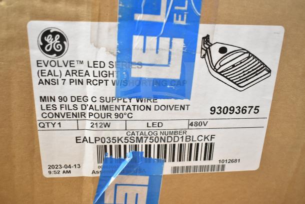 "GE Evolve LED flood lights in original box, catalog number EALP035K5SM750NDD1BLCKF, 212W, 480V, 13 items."