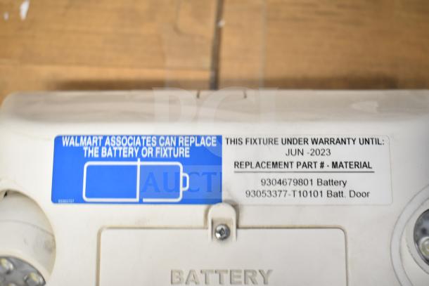DualLite LED emergency light, model includes battery replacement tag, warranty until June 2023. Lightly used condition.
