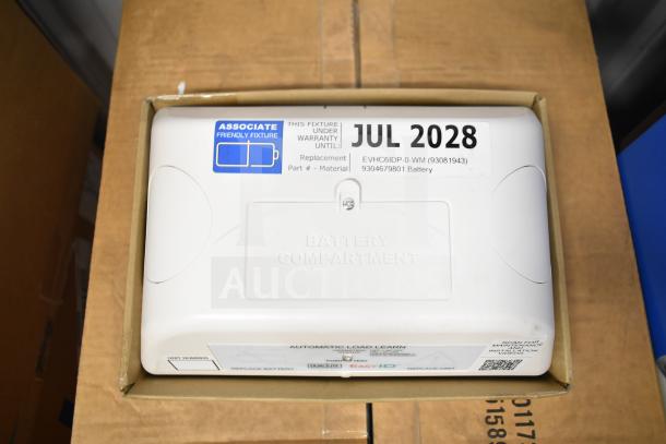 DualLite LED emergency light in box, model EVHC6IDP-0-WM, under warranty till July 2028. Battery compartment visible.