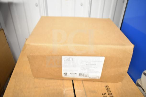 Cardboard box labeled "DualLite LED Emergency Light," containing 5 units. New condition, features LED technology for emergency use.