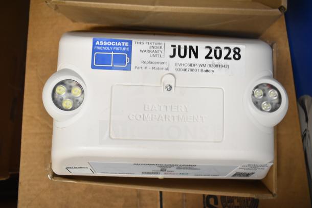 DualLite LED Emergency Light, features dual LED heads, battery compartment, warranty until June 2028.