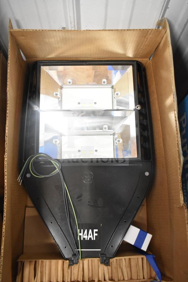 Evolve LED Flood Light in original box, brand new condition, features model H4AF, includes wires for installation.