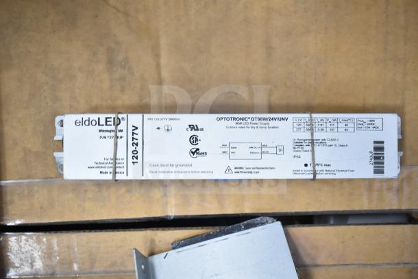 16 items, including LED emergency light battery backup, DualLite double remote heads, and exit signs, labeled for auction.