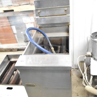 Pitco Frialator SG14 commercial fryer, natural gas, 110,000 BTU, stainless steel, floor model, used condition.