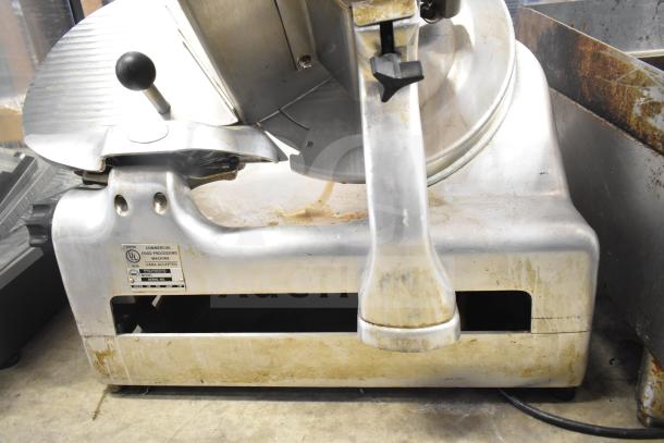 Berkel 818 Commercial Countertop Meat Slicer, shows moderate wear. Features built-in blade sharpener, 115V, 1 Phase.