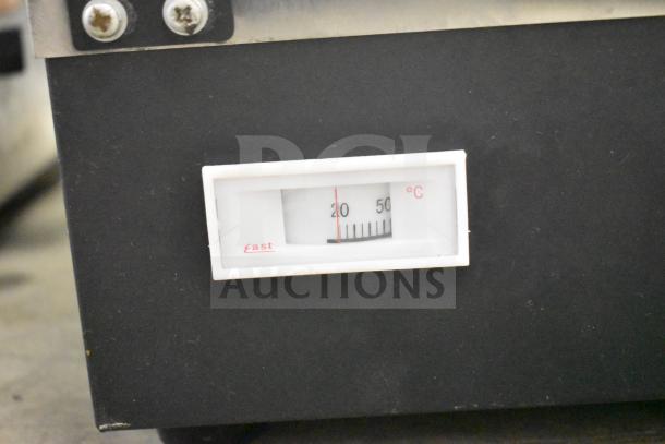 2022 Commercial Countertop Food Warmer Display, 110 volts, 1 phase. Close-up of temperature gauge showing readings.