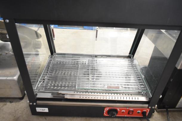 2022 Commercial Countertop Food Warmer Display Merchandiser, 110 Volts, 1 Phase, glass panels, red control dial, excellent condition.