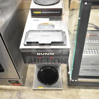 2018 Bunn VP17-2 commercial coffee machine, dual burner, 120V, black with visible caution labels, in used condition.