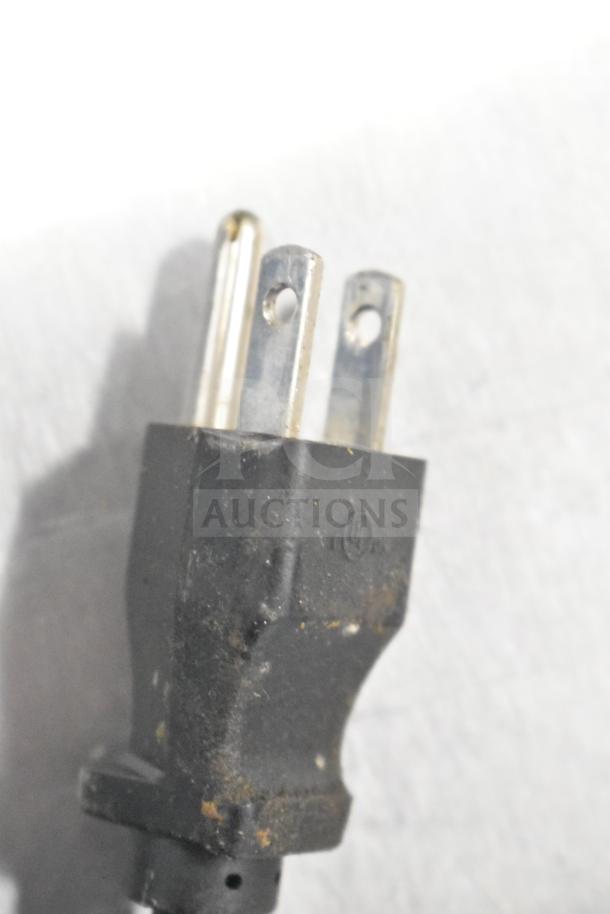 Close-up of a black, three-prong power plug for the 2018 Bunn VP17-2 Commercial Coffee Machine.