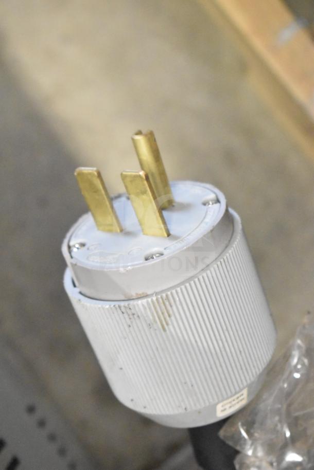 Vollrath Cayenne COA 8005 40702 countertop convection oven power plug, 230V, 1 phase, showing minimal wear.
