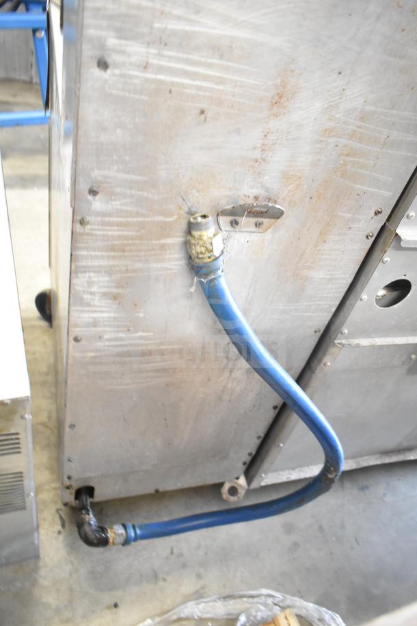 Dean SR42GNS commercial deep fat fryer, 105,000 BTU, natural gas, visible wear, blue gas connector attached.