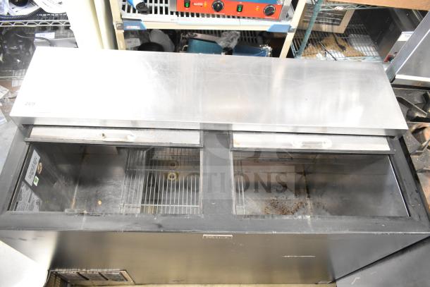 Perlick BC48 commercial back bar cooler with 2 sliding lids, 115 volts, 1 phase. Visible wear, internal racks shown.