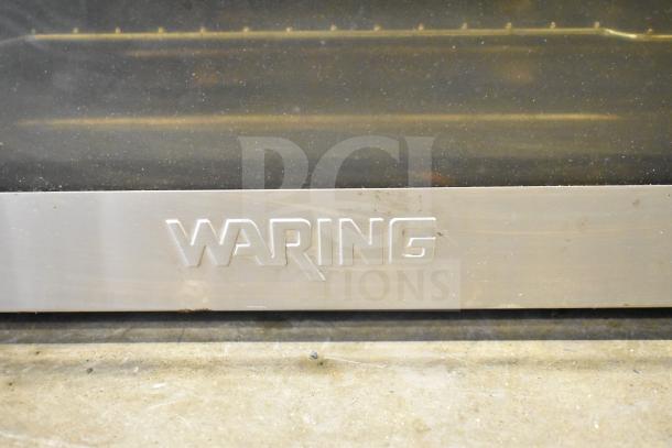 Waring WCO500X Half Size Countertop Convection Oven, stainless steel finish, 120 Volts, visible brand logo on front panel.