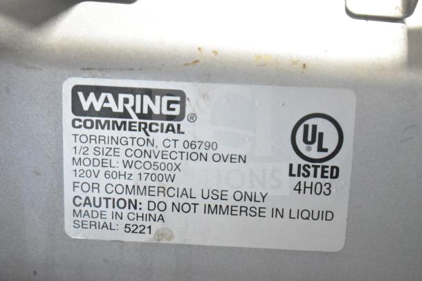 Waring WCO500X half-size countertop convection oven label, 120V, 1700W, for commercial use. Made in China, serial 5221.