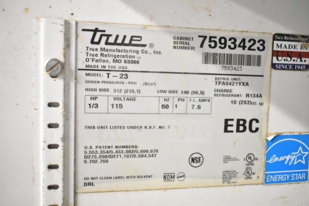 True T-23 Commercial Single Door Cooler label, 115V, 1 phase, R134A refrigerant, NSF certified, serial 7593423.