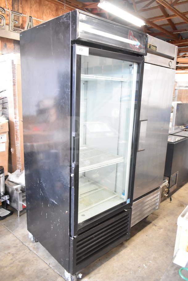 Royal Vendors RVCH-027-02 single door reach-in cooler, 115 volts, black exterior, glass front, on wheels, commercial use.
