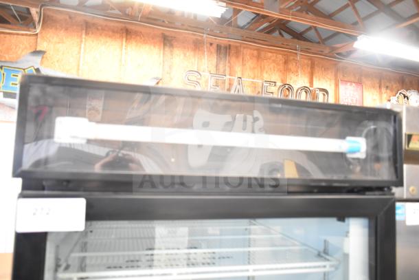 Royal Vendors RVCH-027-02 commercial single door reach-in cooler merchandiser in good condition, 115 volts, 1 phase.