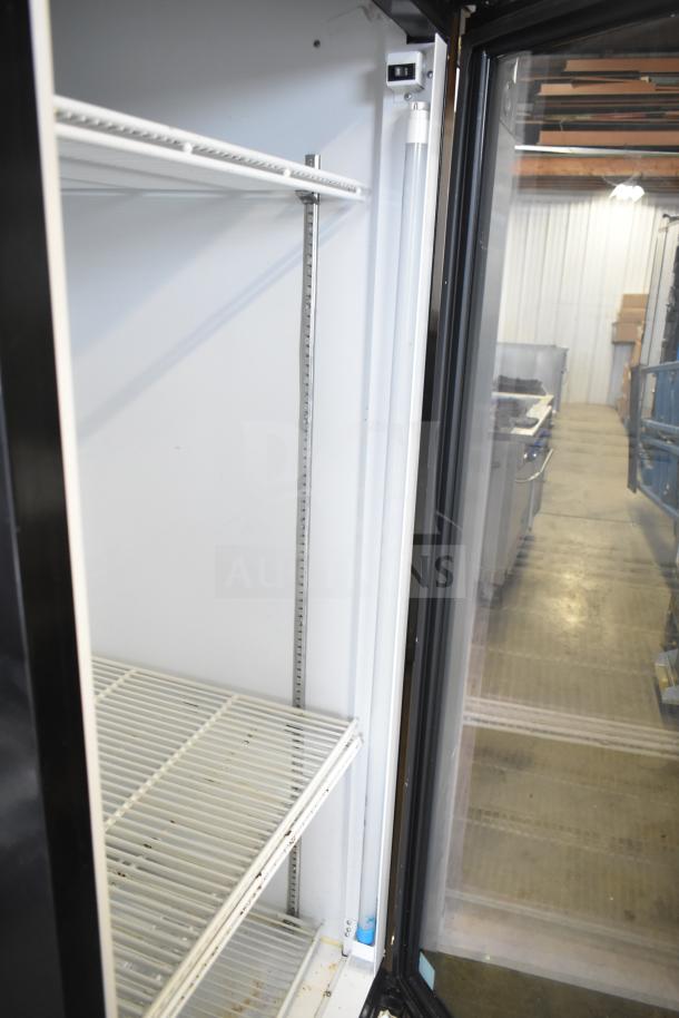 Royal Vendors RVCH-027-02 commercial single door reach-in cooler merchandiser, 115V, 1 Phase, interior view with shelves.
