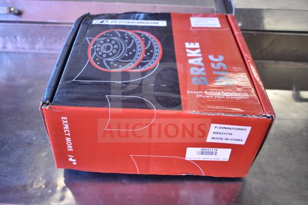 Box of brand new brake discs, model BRS31110, with minor box damage, labeled "Made in China."