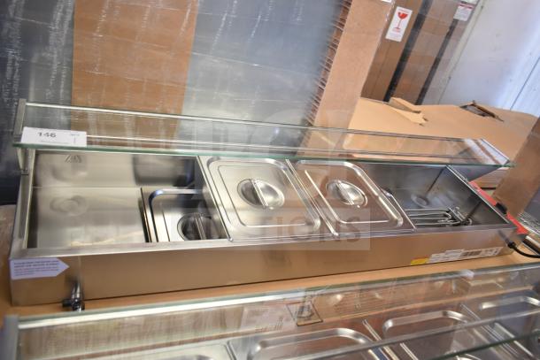 Brand new Avantco 177BMFW5 57" electric bain marie buffet, 5 half-size wells, stainless steel, 120V, slight scratches.