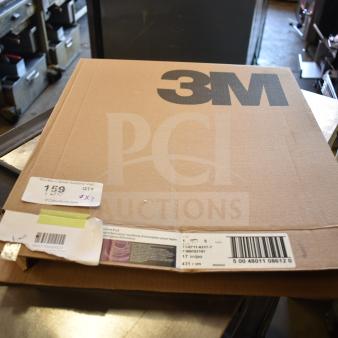 3M 17" White Carpet Bonnet, packaged in box, label shows model 399770000021, 5 per case. Auction lot label visible.