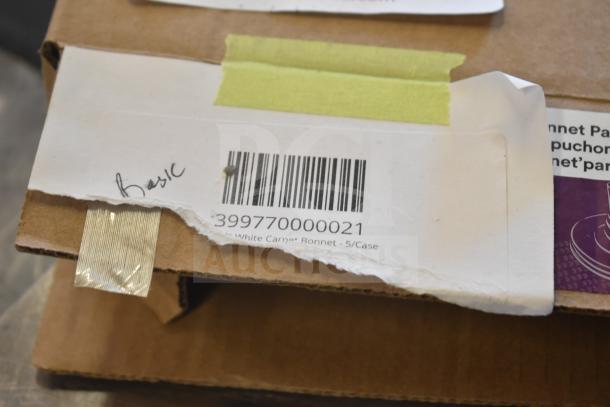 3M 17" White Carpet Bonnet box with label code 399770000021. Includes 5 bonnets per case. Box shows barcode and handwritten note.