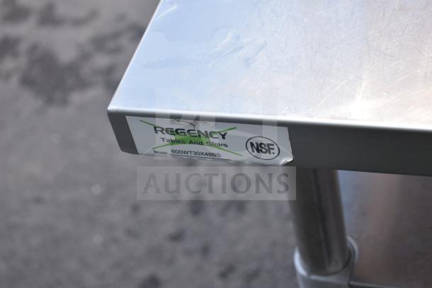Regency stainless steel table with two under shelves, two-tier over shelf, model 600WT30X48BS. NSF certified.
