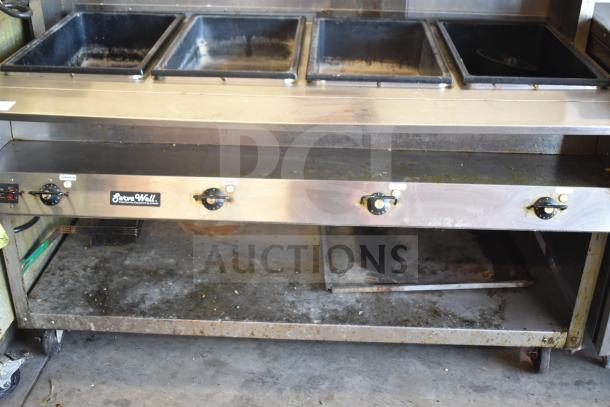 ServeWell Vollrath 38104 4 Well Steam Table, commercial casters, 120V, 1 phase, stainless steel, used condition.