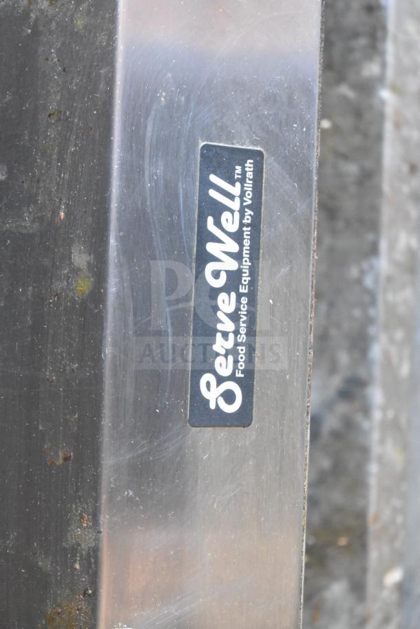 ServeWell Vollrath 38104 label on a stainless steel steam table; commercial food service equipment.