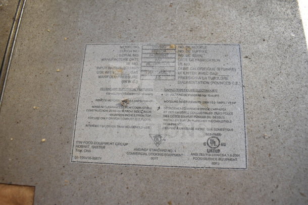 Baxter OV310G commercial oven label showing specifications including 95,000 BTU, natural gas, and electrical requirements.
