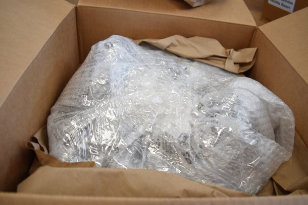 Brand new Globe SG13-84 Commercial 13" Slicer, wrapped in bubble wrap, in box. Late model with blade sharpener.
