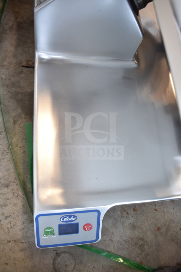 Globe SG13-84 commercial slicer, new scratch and dent condition, features 13" blade, automatic controls, 110V, visible logo.