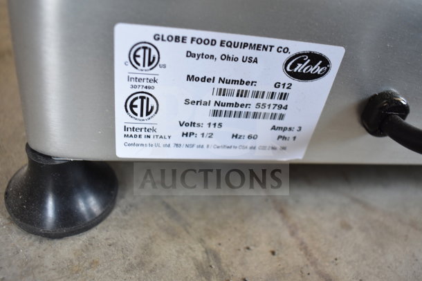 Globe G12 meat slicer label showing model, serial number 551794, 115V, 1 phase, ETL certified, made in Italy.
