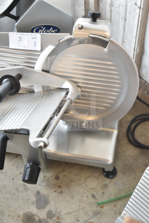 Globe G12 commercial slicer, 12" blade, manual, 115V, new scratch and dent, includes blade sharpener, high-quality build.