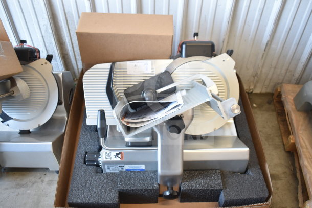 Brand new Globe SG13-84 commercial 13" slicer with blade sharpener, scratch and dent. 110V, 1 phase, premium automatic model.