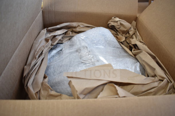Brand new Globe SG13-84 slicer in box, wrapped in bubble wrap and packing paper, 110V, 1 phase, includes blade sharpener.