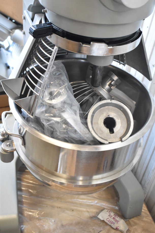 Brand new Globe SP40 40 Qt. planetary mixer with manual bowl lift, bowl guard, dough hook, paddle, whisk, 208V, 1 phase.